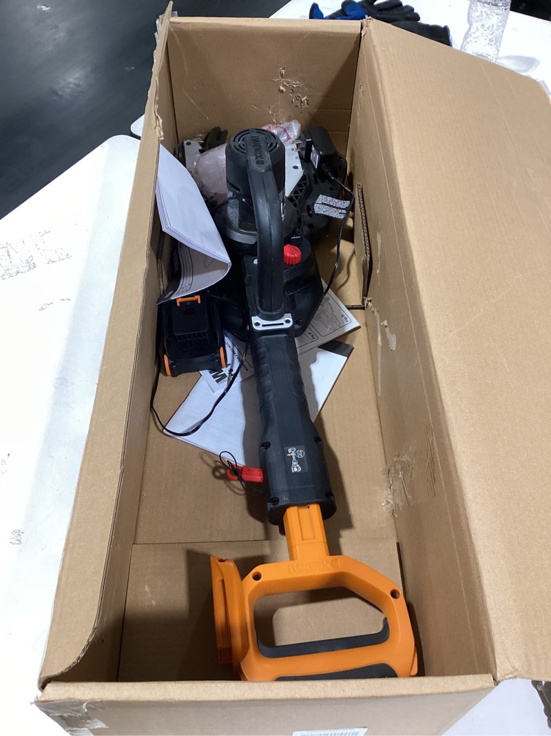 Condition photo showing As Is for worx 20v jawsaw cordless chainsaw power share - wg320 (battery & charger included)