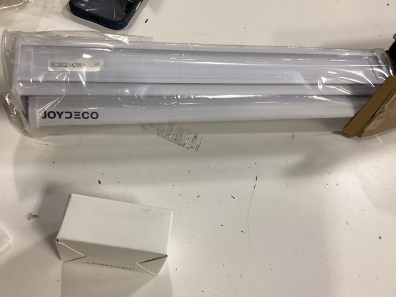 Condition photo showing New/Like New for joydeco cordless zebra blinds for windows, dual layer light control window blinds with light-proof aluminum cover, free-stop roller shades for home & office (white,16" w x 48" h) upgrade- white (aluminum cover) 16"w x 48"h