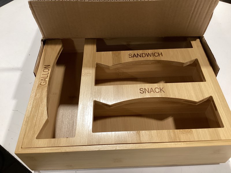 Condition photo showing Good Condition for 6 in 1 storage bag organizer kitchen drawer, bamboo foil and plastic wrap dispenser with slider cutter, kitchen bag organizer for quart, gallon, sandwich and snack bags natural bamboo