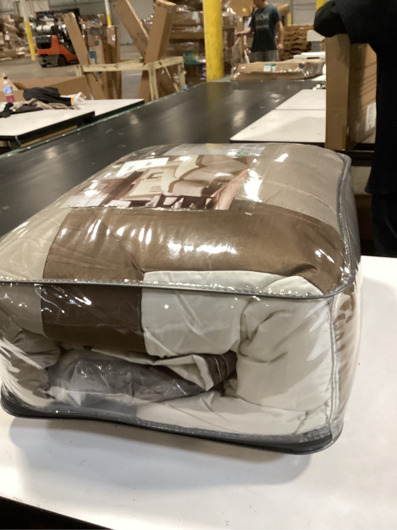 Condition photo showing New/Like New for madison park cozy comforter set-deluxe hotel collection, all season down alternative luxury bedding with matching shams, decorative pillows, king (104"x92"), genevieve, taupe/brown 7 piece