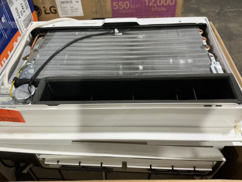 Condition photo showing As Is for lg 14,000 btu 115-volt window air conditioner unit cools 700 sq. ft. with wi-fi, remote, dehumidifier and in white