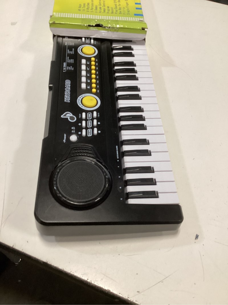 Condition photo showing Good Condition for Kids Piano Keyboard with Microphone, 49 Keys Portable Electronic Piano Keyboard for Kids Beginners Ages 3 4 5 6 7, Toy Music Keyboard Birthday Xmas Gift for Girls Boys, Black