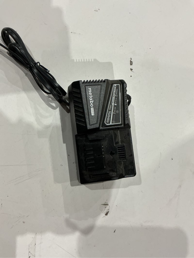 Condition photo showing Good Condition for (charging base not)

 includedmetabo hpt 18v multivolt compact cordless brad nailer kit, 18 gauge nailer with power tool 2.0ah lithium ion battery, drives 5/8\" to 2\" brad nails, 700 per charge, nt1850dg nt1850dg only