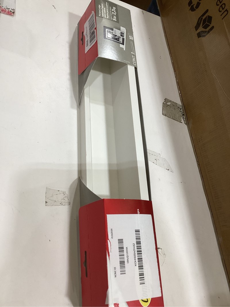 Condition photo showing New/Like New for Command Picture Ledge, 21" Damage Free Hanging Floating Shelf with Adhesive Strips, Quartz, No Tools Picture Hanger for Displaying Decorations and Photographs, 1 Ledge and 10 Strips