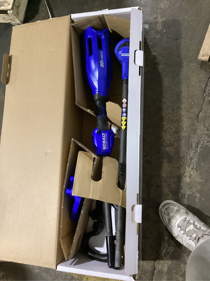 Condition photo showing As Is for (possibly missing pieces & possibly incomplete)kobalt 80-volt 16-in straight shaft battery string trimmer 2.5 ah (battery included) (charger included)