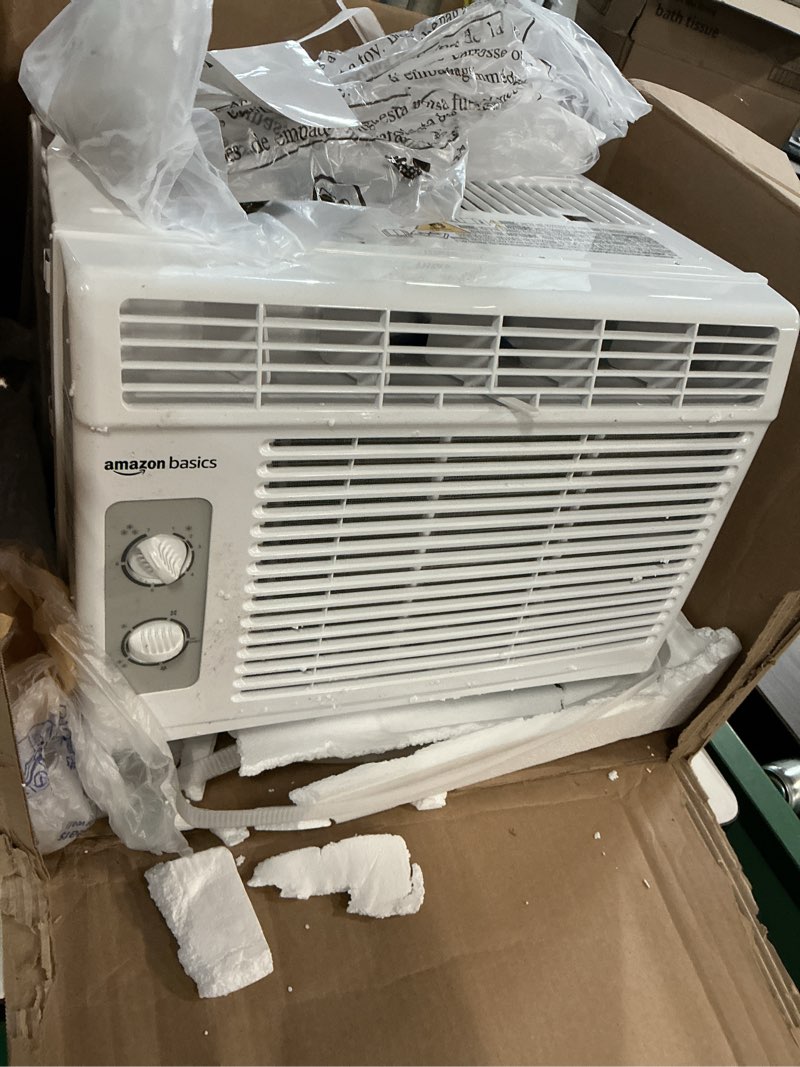 Condition photo showing As Is for amazon basics 5000-btu small window air conditioner, up to 150 sqf, window ac units with cool and fan functions, washable filter, adjustable window kit, intuitive mechanical controls, white white 5000 btu
