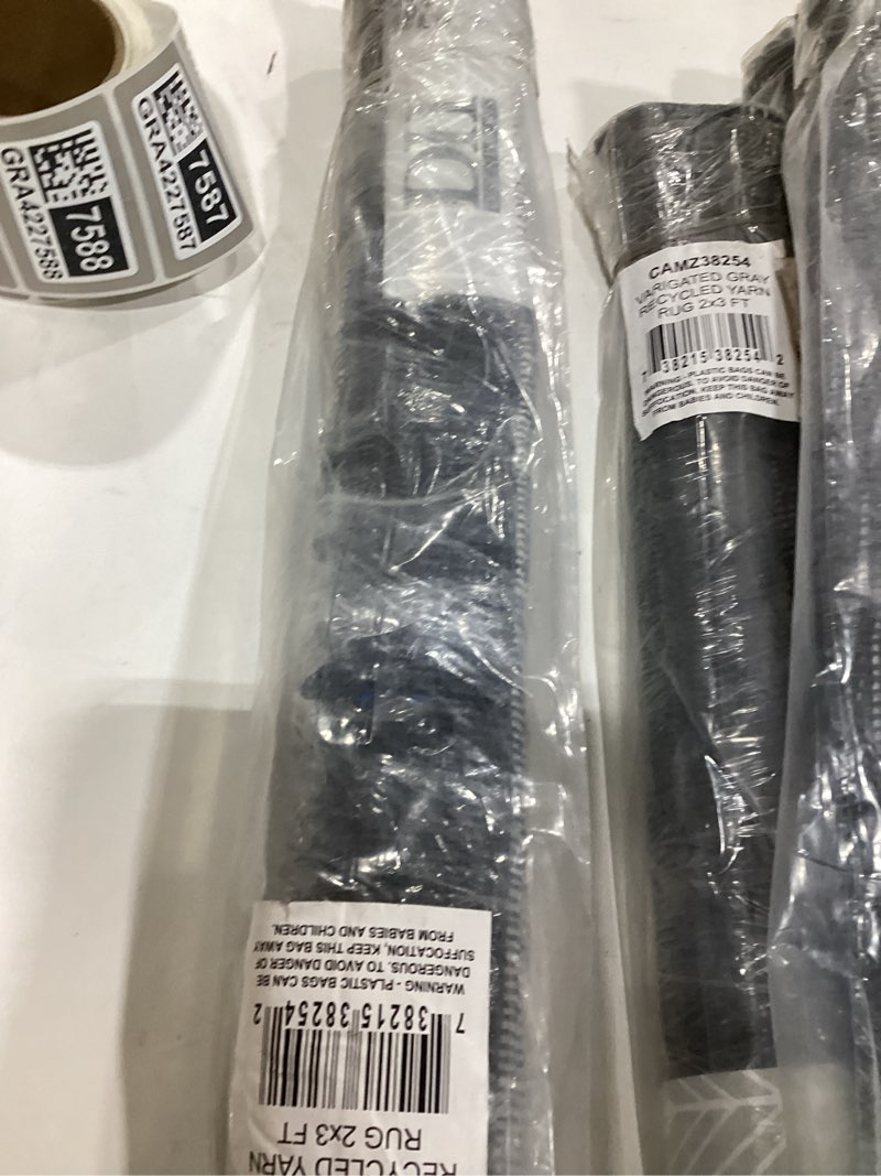 Condition photo showing New/Like New for DII Variegated Recycled Yarn Modern Edge Stripe, 2x3', Gray