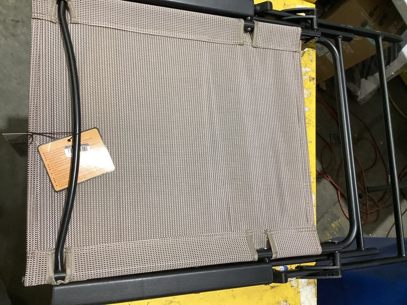 Condition photo showing As Is for sling folding patio chair - tan - room essentials
