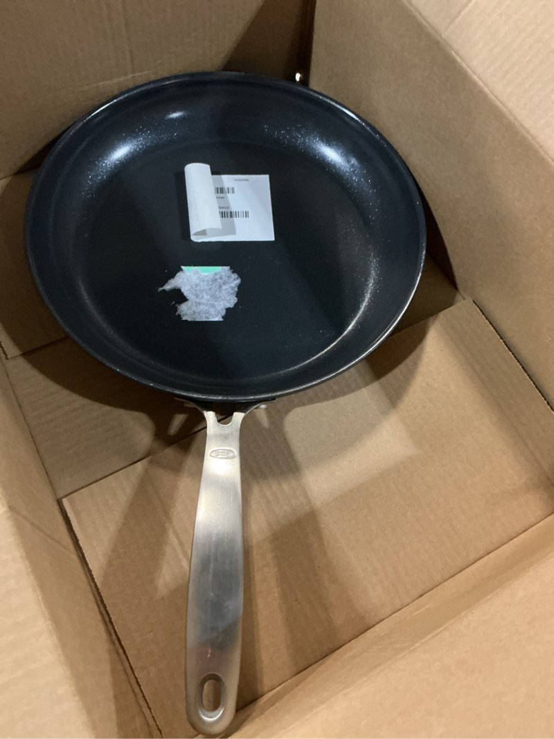 Condition photo showing Good Condition for oxo enhanced 12" frying pan skillet, pfas-free ceramic nonstick, durable hard anodized cookware, scratch resistant, stainless steel handle, good grips, dishwasher & oven safe, black black 12" frying pan skillet