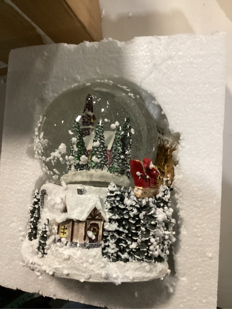 Condition photo showing Good Condition for RAZ Imports 4200760 House with Santa and Sleigh Musical Lighted Swirling Glitter Water Globe, 6.5-inch Height, Resin and Glass