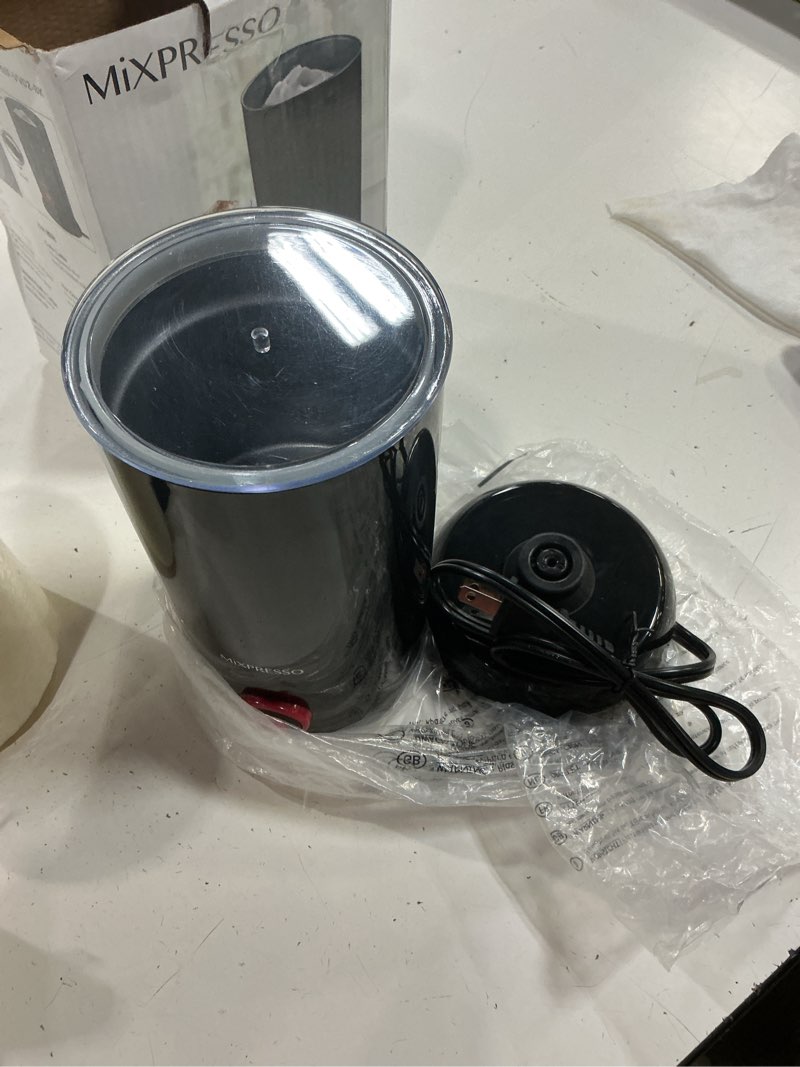 Condition photo showing As Is for mixpresso electric milk frother, stainless steel milk steamer & milk warmer, automatic shutoff, non-stick interior, cool touch, 9.4 oz/6.0oz capacity, black electric frother for hot chocolate