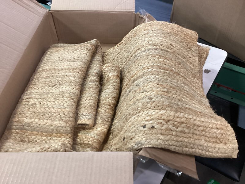 Condition photo showing Good Condition for Hausattire Hand Woven Jute Braided Rug, 4'x6' – Natural, Reversible Boho Entry Area Rugs for Kitchen, Living Room I Farmhouse Indoor Outdoor Decorative Floor Rug, 48x72 Inches
