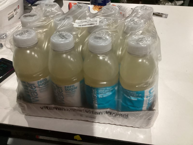 Condition photo showing New/Like New for vitaminwater Zero Sugar Squeezed Lemonade Nutrient Enhanced Flavored Water Beverage, 20 fl oz Bottles, 12 pack Zero Sugar Squeezed Lemonade 20 Fl Oz (Pack of 12)