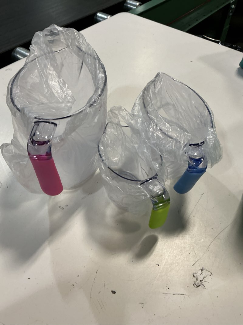 Condition photo showing Good Condition for vremi 3 piece plastic liquid measuring cup set, stackable, red blue and green handles