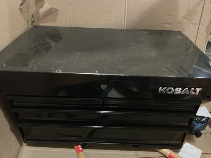 Condition photo showing As Is for kobalt 35-in w x 37.5-in h 4 -drawer steel rolling tool cabinet ( black )