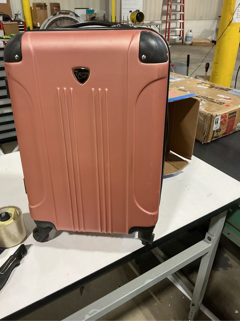 Condition photo showing As Is for amazon basics 30" hardside large checked luggage with multi-directional wheels, expandable for up to 15% more space, scratch-resistant hardshell, navy blue navy blue large checked