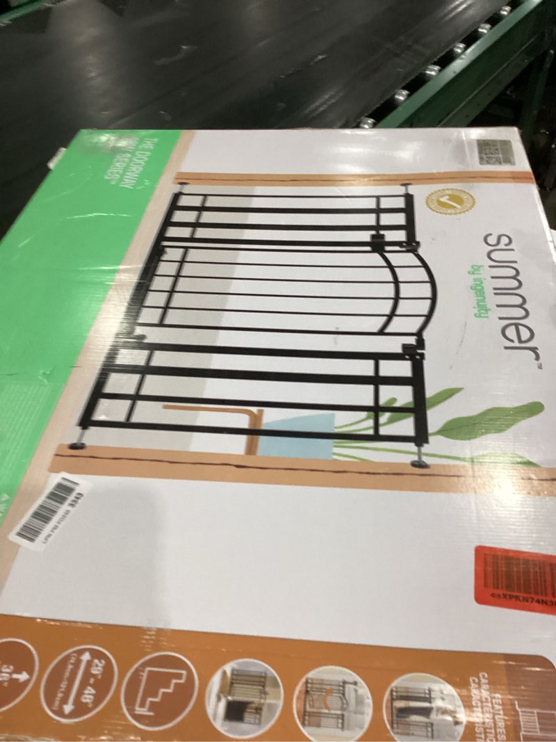 Condition photo showing Good Condition for Ingenuity Multi-Use Decorative Extra Tall Walk-Thru Baby Gate, Fits Openings 28.5-48 Inch (Pack of 1), Black Metal, for Doorways and Stairways, 36' Tall Baby and Pet Gate, Black, One Size
