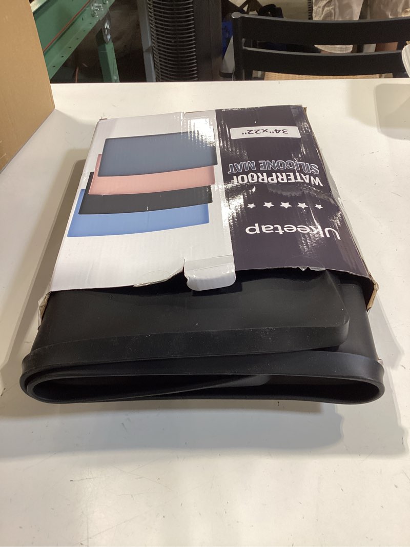 Condition photo showing Good Condition for ukeetap extra thick silicone mat waterproof with raised edge 34" x 22", under sink mat for kitchen & bathroom, kitchen cabinet liner, multi-purpose for storage & protection, black black 34"l x 22"w