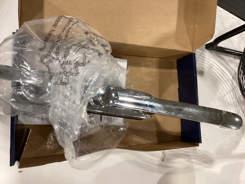 Condition photo showing As Is for project source dover chrome double handle deck-mount kitchen faucet (includes deck plate)