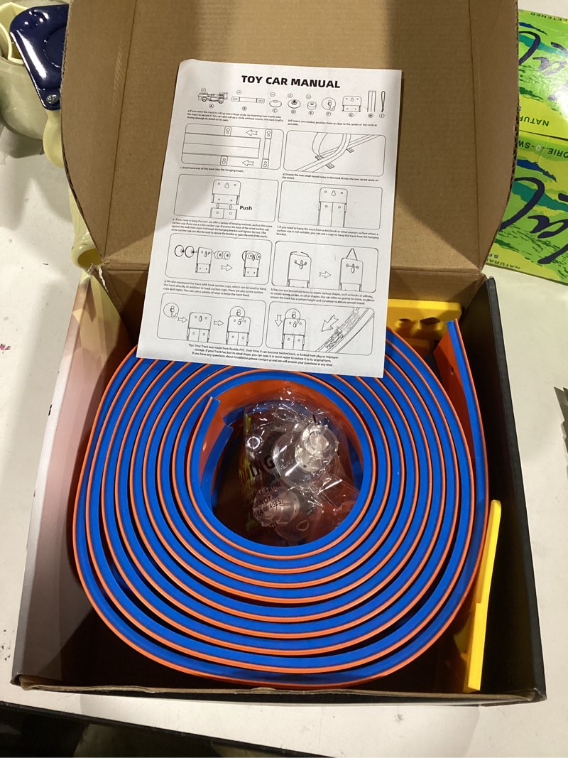 Condition photo showing Good Condition for Flexible Race Track Toys for Kids 15 Ft with 4 Cars & Suction Cups, Portable Double Lane Racetrack Compatible with Hot Wheels & 1/64 Diecast Cars, Fun Car Ramp Track Set for Ages 3+(Orange & Blue)