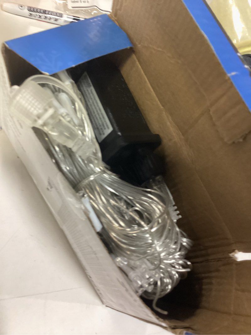 Condition photo showing As Is for JOYIN 200 LED Christmas Net Lights, 6.5X 10FT Christmas Mesh Lights with 8 Modes, Connectable, Waterproof for Bushes Trees Yard Indoor Outdoor Xmas Decorations (Cool White) Cool White 200LED