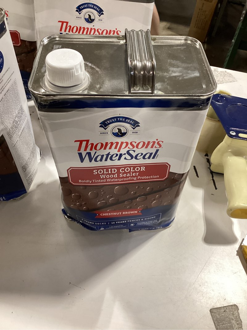 Condition photo showing As Is for thompson’s waterseal solid color waterproofing wood stain and sealer, chestnut brown, 1 gallon