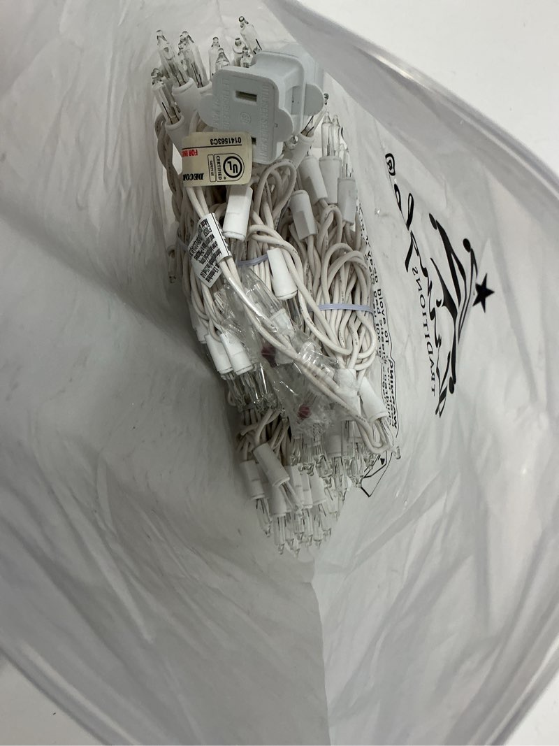 Condition photo showing As Is for Kringle Traditions 8.5 Ft 150 Clear Icicle Christmas Lights – White Wire Indoor/Outdoor String Lights for House and Roof Decorations