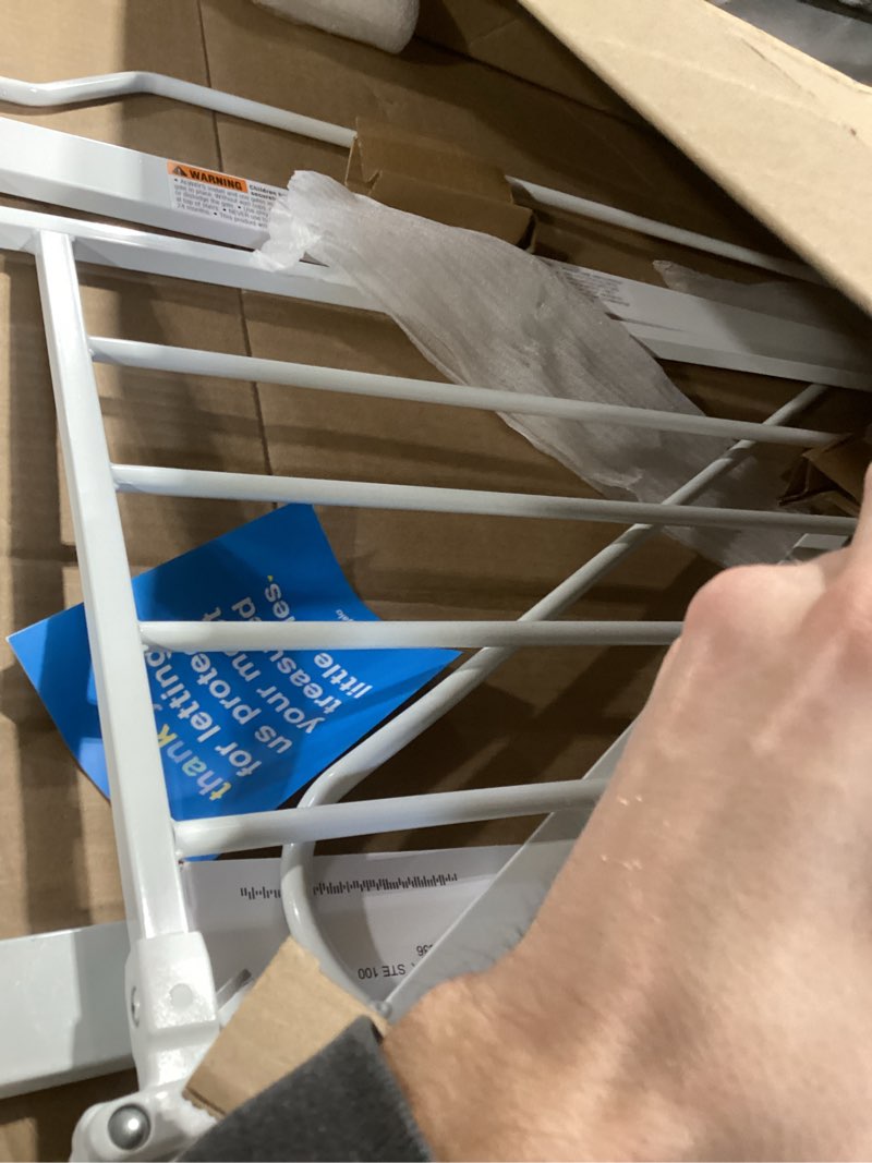 Condition photo showing As Is for Regalo Easy Step Extra Tall Walk Thru Baby Gate, Includes 4-Inch Extension, and 4 Pack of Wall Cups and Mounting Kit, White White 29-36.5\"W x 36\"H INCOMPLETE 