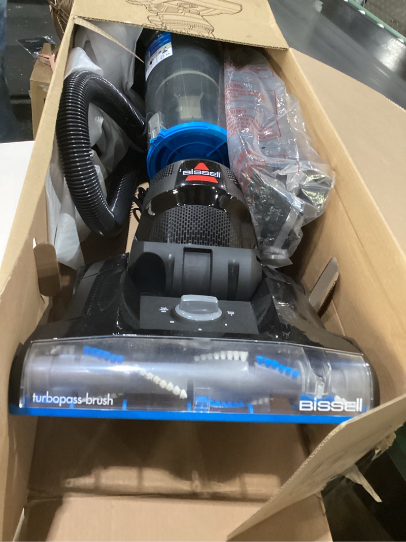 Condition photo showing As Is for bissell cleanview swivel rewind vacuum with automatic cord rewind, turboeraser upholstery tool, triple action brush roll, swivel steering, extension wand, easy-empty dirt tank, multi-cyclonic suction blue, not tested