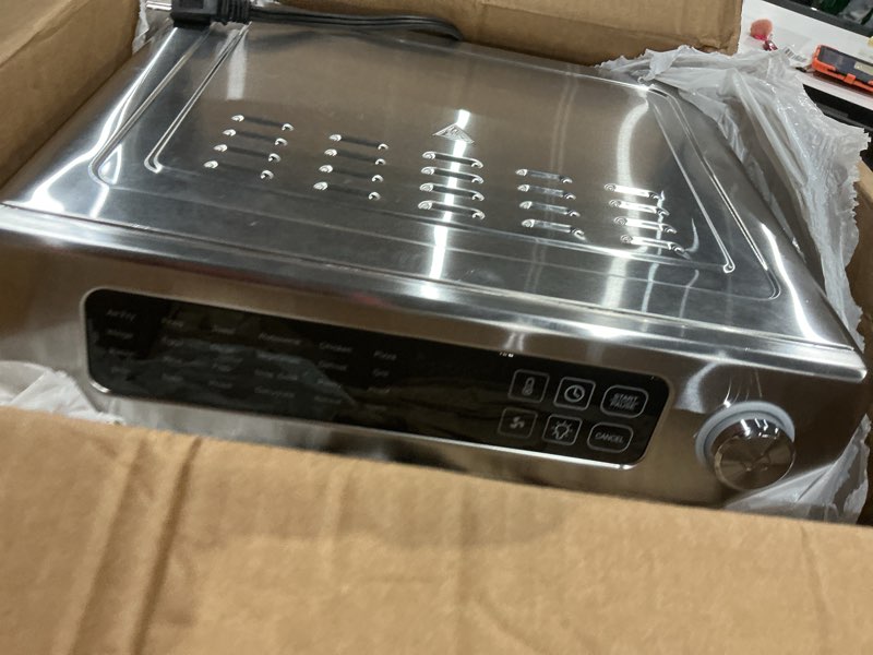 Condition photo showing Good Condition for dan - emeril lagasse extra large french door air fryer toaster oven combo, 24 cooking functions and digital controls, 7 accessories included, stainless steel finish, 26qt capacity