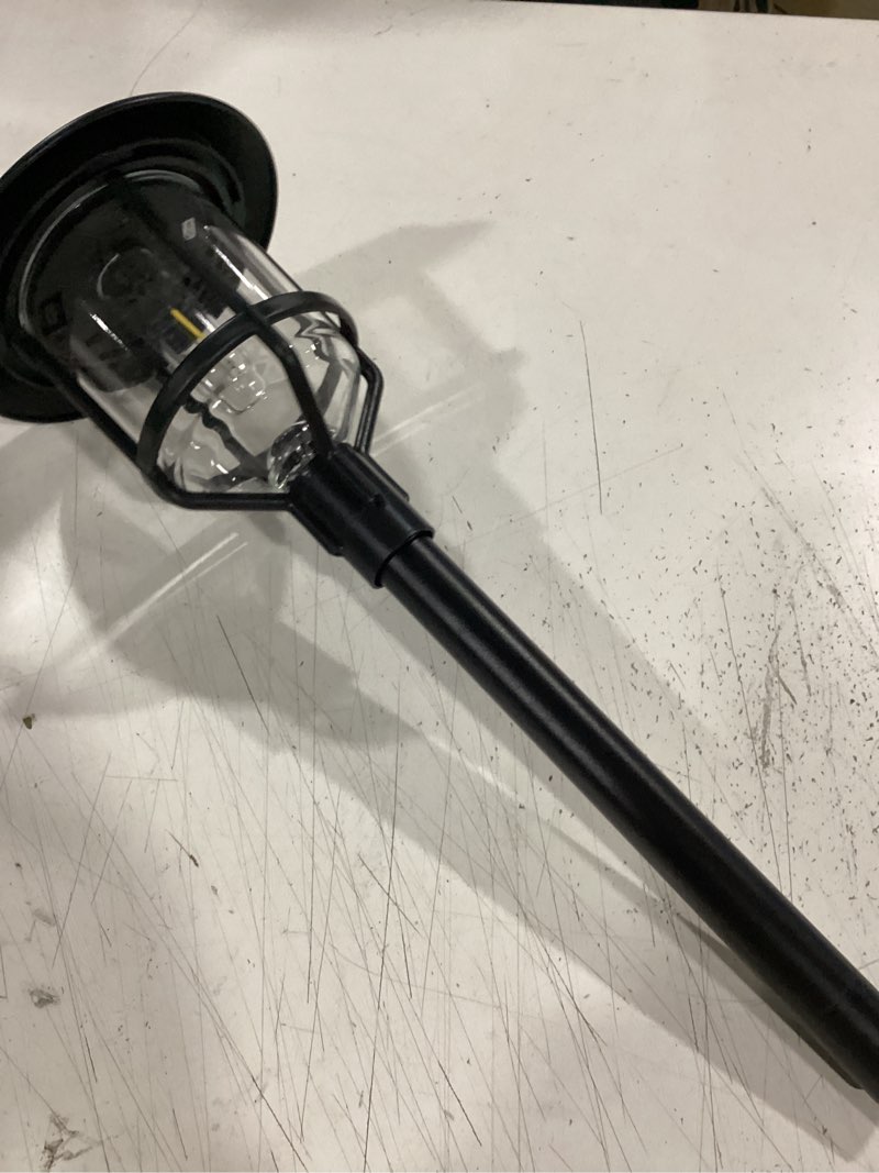 Condition photo showing As Is for harbor breeze path light 15 -lumens 0.2 -watt black solar led outdoor path light ( 3000-k )