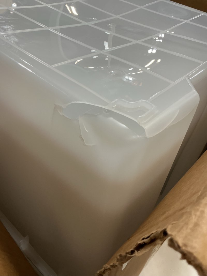 Condition photo showing Good Condition for iris usa 3-pack 156 qt storage bins with gasket lids, clear/black | weatherpro seal helps protect bulky items for moving, garage, attic and basement storage 156 qt 3 pack (1 tote damaged at bottom)