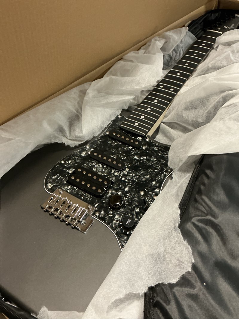 Condition photo showing Good Condition for enya xmari smart electric guitar with built-in dsp effects, 4 presets, usb-c otg recording, headphone output, custom ceramic pickups, carbon fiber body, with gig bag, strap, cable & picks