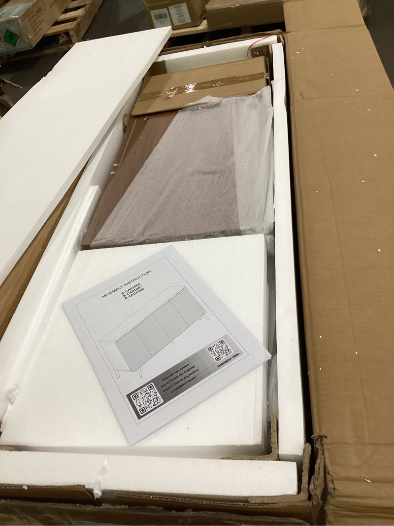 Condition photo showing New/Like New for Walker Edison Reema Fluted 4-Door Kitchen Sideboard Buffet Console, (walnut finish, similar to this product)