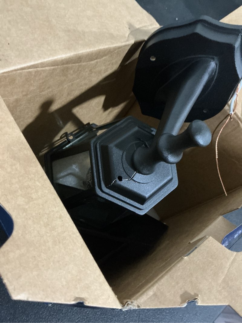 Condition photo showing As Is for project source eastbend 1-light 14-in h black outdoor wall light