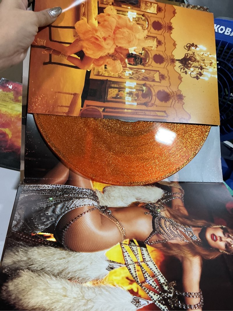Condition photo showing Good Condition for the life of a showgirl[sweat & vanilla perfume orange glitter vinyl]