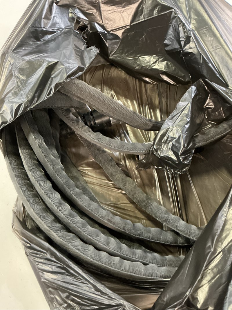 Condition photo showing As Is for zero-g teknor apex 5/8-in x 25-ft premium -duty kink free woven gray hose