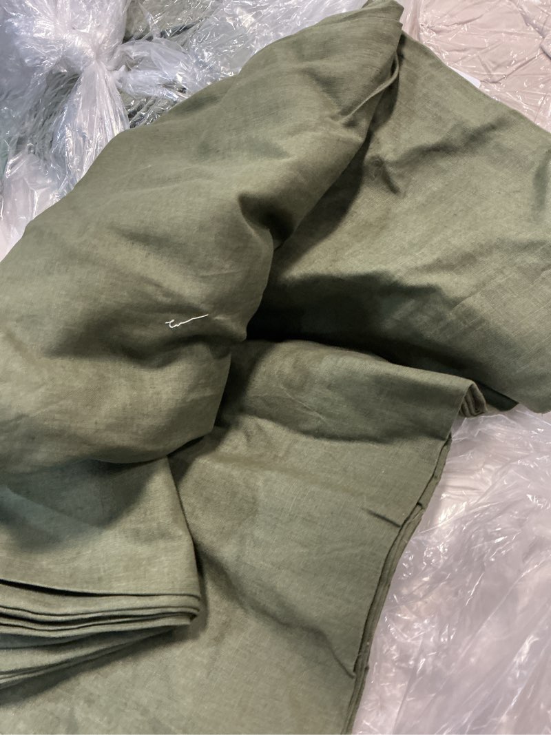 Condition photo showing As Is for european linen true blackout curtain, 48x96, hunter green