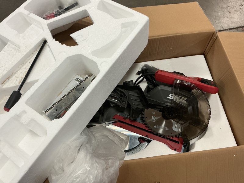 Condition photo showing As Is for skil 10" dual bevel sliding compound miter saw-ms6305-00