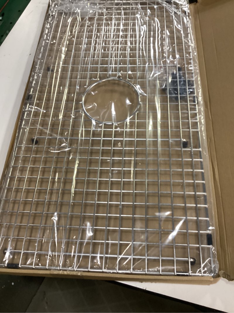 Condition photo showing New/Like New for serene valley sink bottom grid 29-1/2" x 15-9/16", centered drain with corner radius 3/8", sink protector ndg3016c