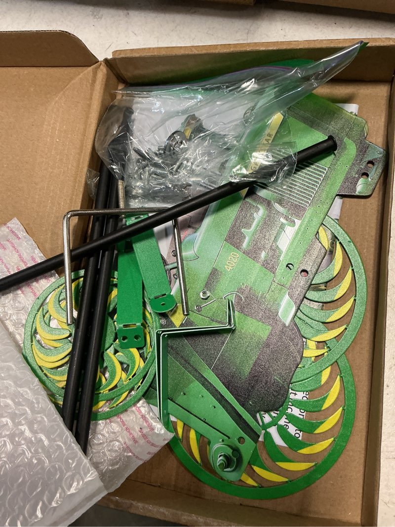 Condition photo showing New/Like New for garden wind spinner, green tractor windmill stake with rotating wheels for patio yard garden, unique outdoor sculptures ornament gift for friends family (tractor)
