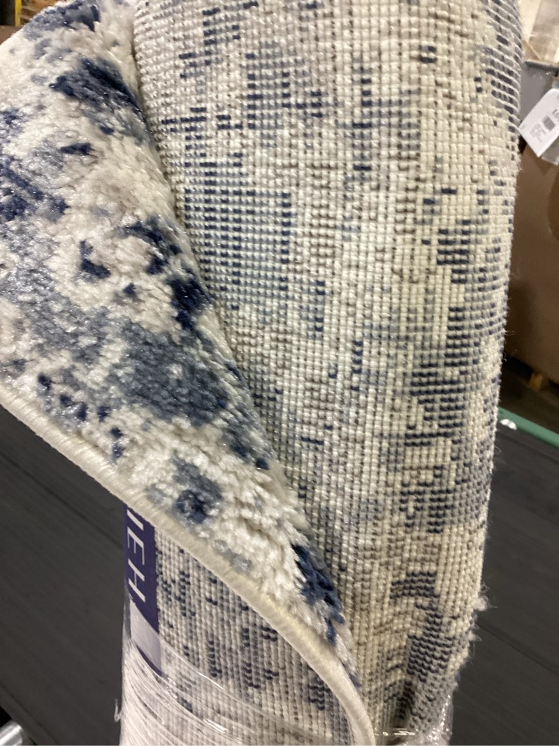 Condition photo showing Good Condition for safavieh amelia marche 5 x 8 (ft) navy/gray indoor abstract area rug