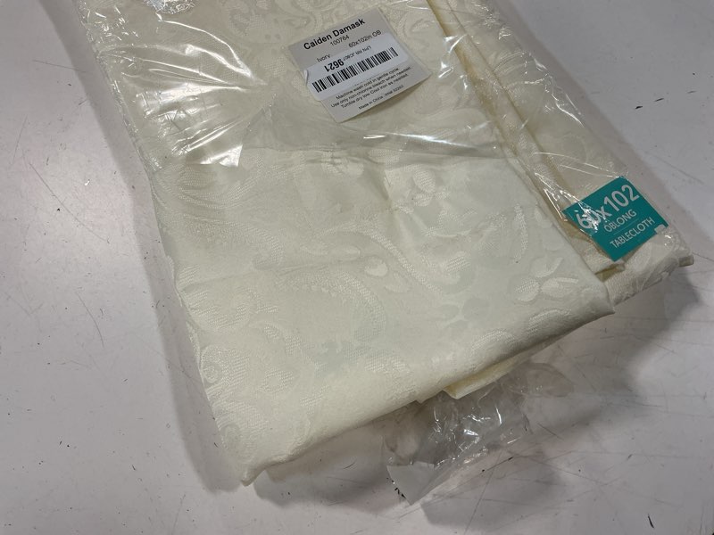 Condition photo showing Good Condition for elrene home fashions caiden elegance damask waterproof, stain & wrinkle resistant fabric tablecloth, 60" x 102" oblong/rectangle, ivory tablecloth (1) ivory 102" x 60" (rectangular)