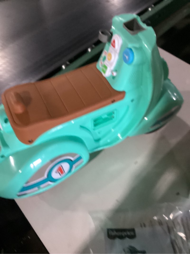 Condition photo showing Good Condition for Fisher-Price Toddler Ride-On Toy Laugh & Learn Smart Stages Cruise Along Scooter with Lights Music & Learning for Infants Ages 1+ Years (Amazon Exclusive)