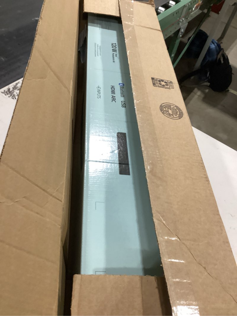 Condition photo showing New/Like New for Sony S100F 2.0ch Soundbar with Bass Reflex Speaker, Integrated Tweeter and Bluetooth, (HTS100F), easy setup, compact, home office use with clear sound black