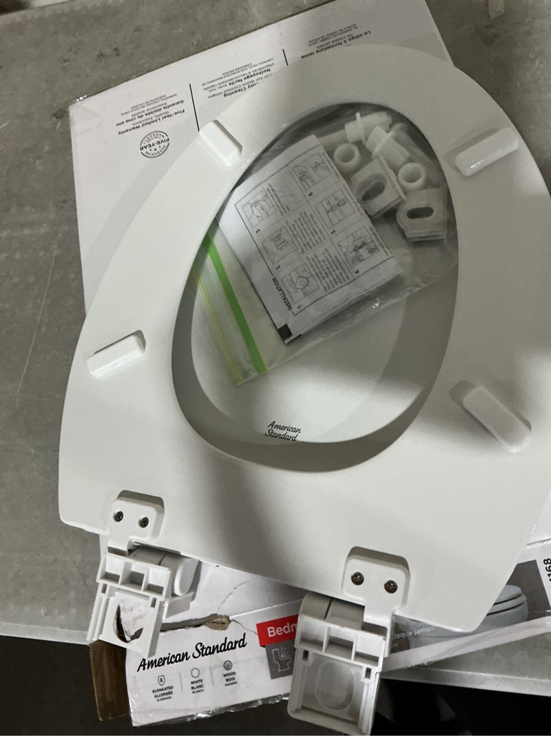 Condition photo showing Good Condition for american standard bedminster wood white elongated soft close toilet seat