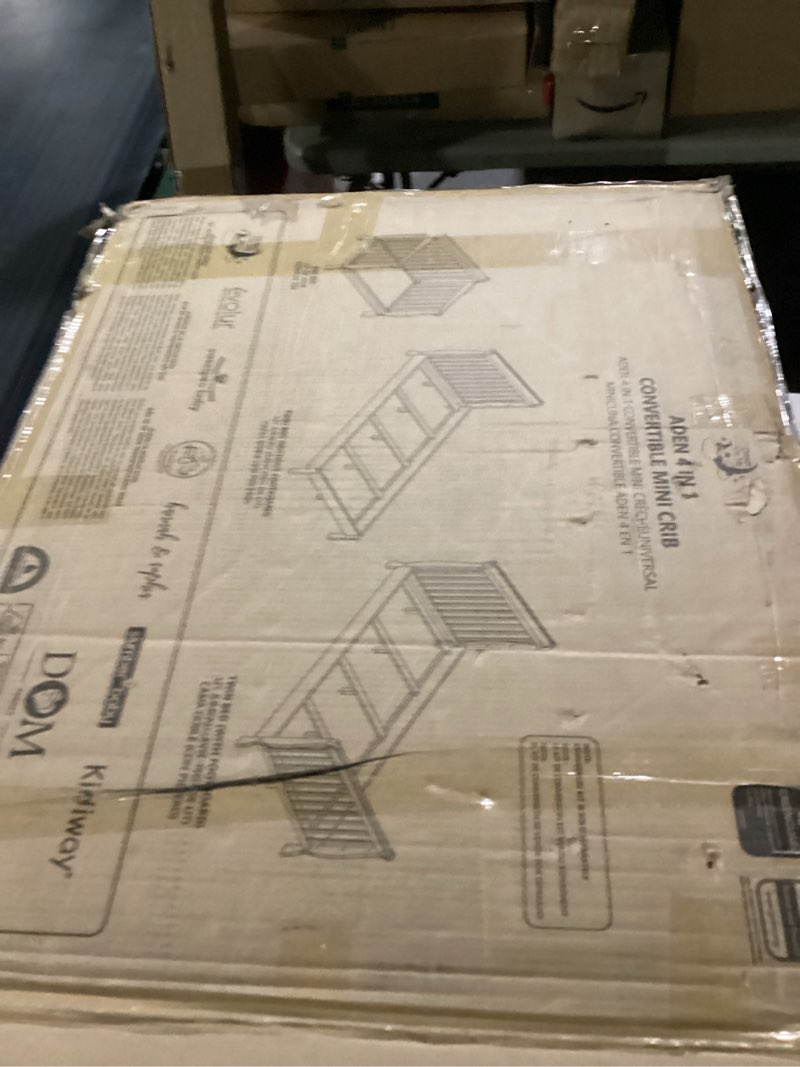 Condition photo showing New/Like New for dream on me aden 4-in-1 convertible mini baby crib in natural, greenguard gold & bsa, sustainable pinewood, non-toxic finish, 3 mattress heights, converts to mini day & twin-size bed