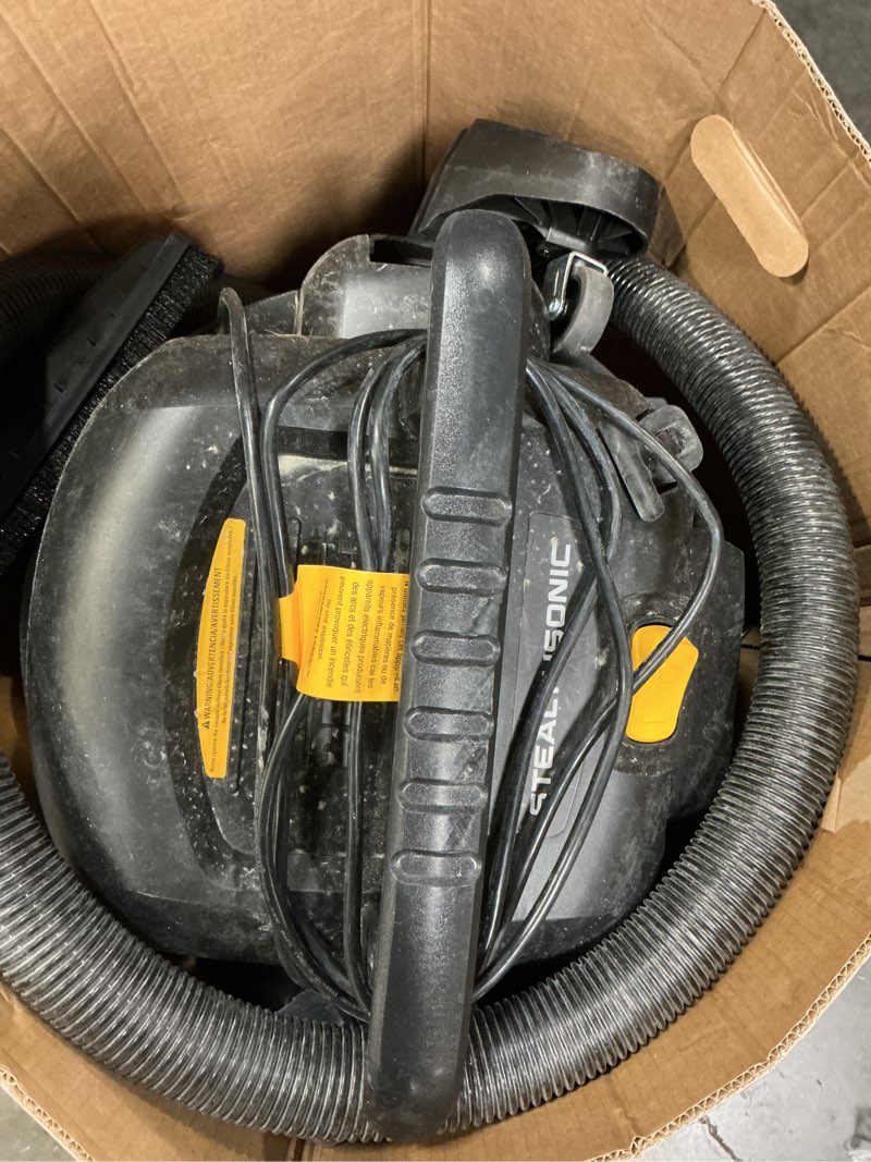 Condition photo showing As Is for DEWALT Stealthsonic Quiet 9 -Gallon 5.0 HP Corded Wet/Dry Shop Vacuum with Accessories