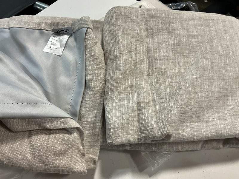 Condition photo showing As Is for quince textured cotton curtian 48”x96” sand