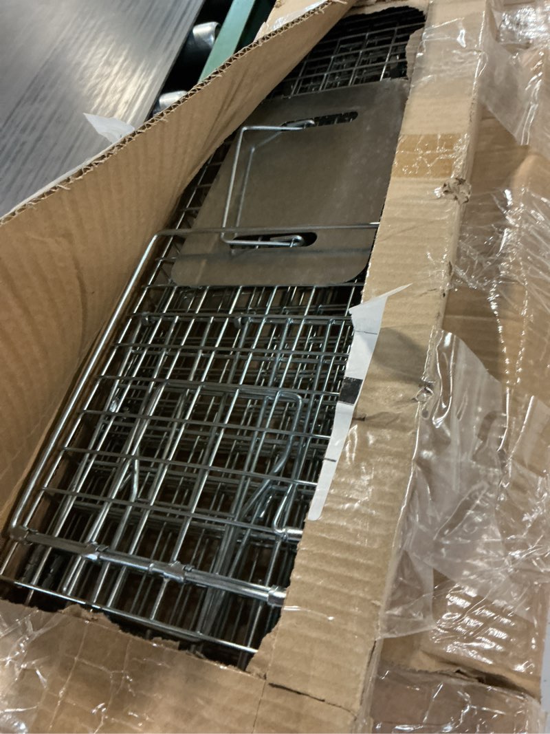 Condition photo showing As Is for qualirey 2 pack live animal trap cage 24.41 x 7.09 x 8.27 inch cat trap cage foldable steel humane catch and release animal for groundhog squirrel raccoon mole gopher(silver)